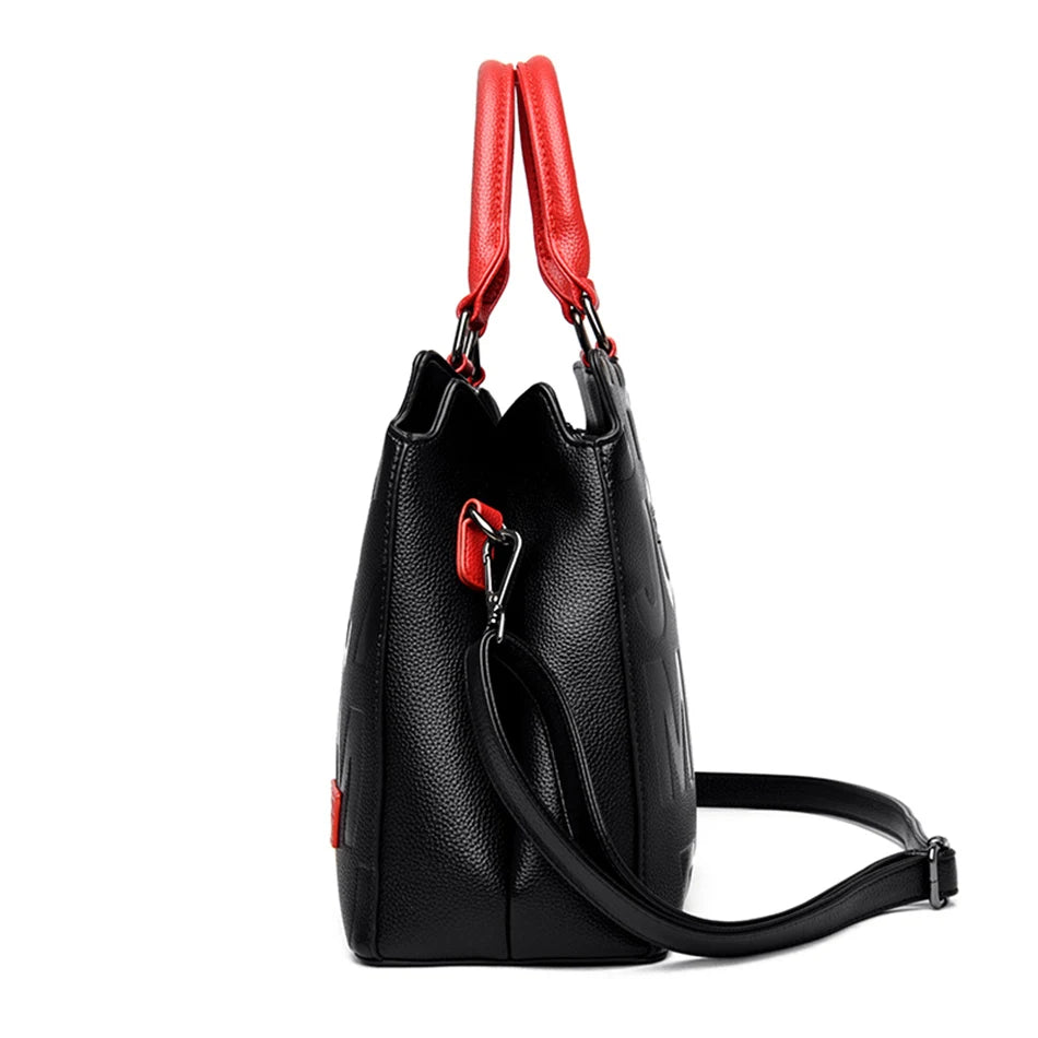 Alpha Embossed Designer Handbags