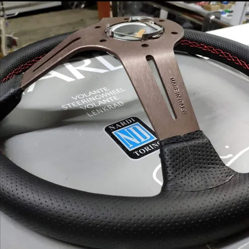 NARDI Universal Bronze Titanium Frame Black Leather Steering Wheel
