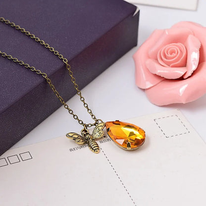 Vintage Amber & Bee Crystal Pendants