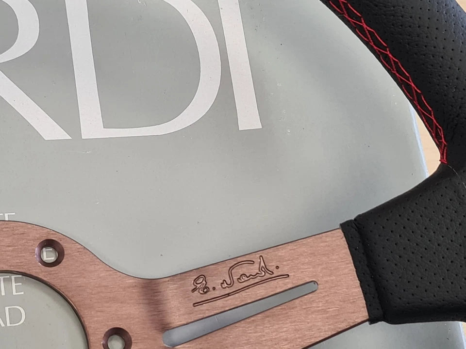NARDI Universal Bronze Titanium Frame Black Leather Steering Wheel
